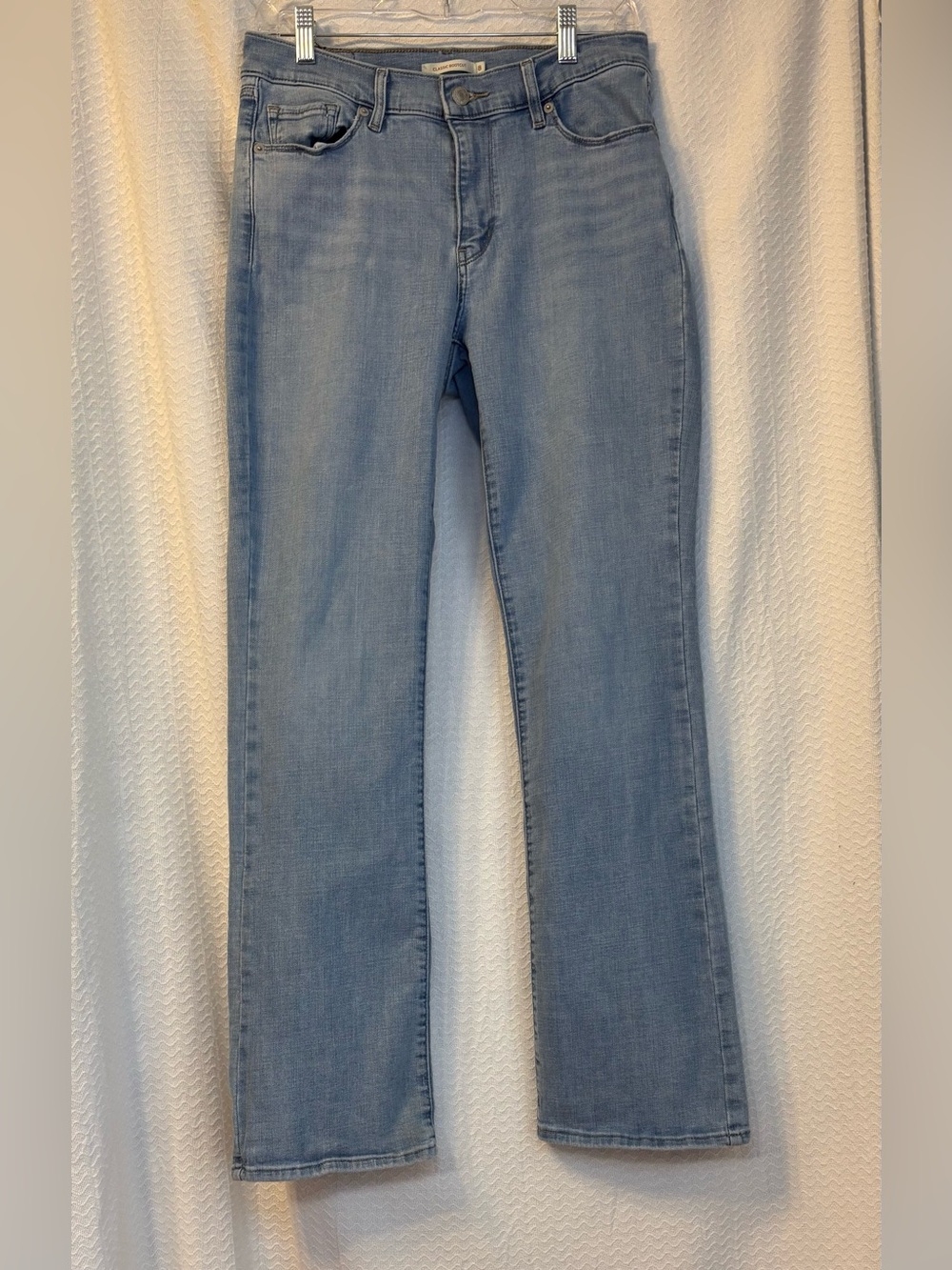 Levi’s mid-rise, classic bootcut jeans. 
Size 8.  Like new!